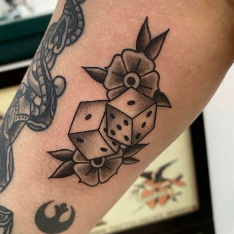 Floral dice tattoo: Dice Tattoo, Archangel Tattoo, Date Tattoos, Bull Tattoos, Western Tattoos, Traditional Tattoo Sleeve, Tattoo Magazines, Matching Tattoo, Dream Tattoos