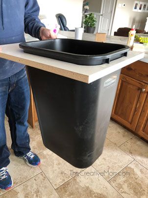 DIY Pull out Trash Cabinet - The Creative Mom Diy Trash Can Cabinet How To Build, Diy Pull Out Trash Can, Diy Trash Can Cabinet, Pull Out Trash Cabinet, Trash Can Storage Kitchen, Kitchen Trash Can Ideas, Hidden Trash Can Kitchen, Hide Trash Cans, Garbage Can Storage