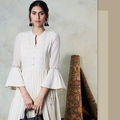 Re-introducing delicate embroidery, clean lines, soft, breezy colours and new twists in classic tailoring in this season’s Solid Kurta… Bell Sleeves Kurti Indian, Flared Sleeves Kurti, Flared Kurti Designs, Bell Sleeves Kurti, Sleeves Kurti, College Dress, Kurti Sleeves Design, Ritu Kumar, Salwar Designs