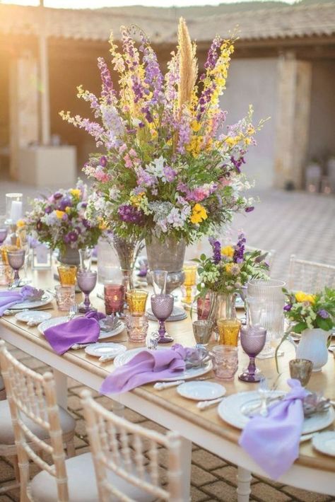 yellow and purple wedding table ideas Wedding Theme Table Settings, Theme Table Settings, Yellow And Purple Wedding, Purple Wedding Flowers Bouquet, Purple Wedding Flowers Centerpieces, Purple Table Settings, Purple Wedding Tables, Light Purple Wedding, Dark Purple Wedding