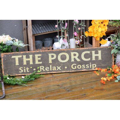 This wall sign is made of firwood and MDF. Size measures approx 47.625" W and 9.875" L and 1.375" D. Includes pre-mounted hangers on the back for hanging, but will also look great standing or propped up as decor. Primitive style with distressed details gives this home accent vintage charm and appeal. Perfect to give as a gift to anybody that loves farmhouse or fixer upper style country rustic decor. | Gracie Oaks Rustic the Porch Wood Wall Decor black/Brown/White 9.8 x 47.62 x 1.37 in, Solid + M Porch Wood, Porch Sitting, Primitive Style, Fixer Upper Style, Country Decor Rustic, Accent Wall Decor, The Porch, Wood Home Decor, Wood Wall Decor