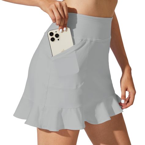 PRICES MAY VARY. Flowy Tennis Skort- Ruffle hem design looks trendy, delicate and cute, lightweigh fabric will keep you cool and comfortable during intense workouts and casual wear Tummy Control- High waisted golf skort keeps you enjoy the added tummy control and slimming effect,and you will feel confident and soft Function Pockets-This womens skort with 4 pockets provide convenient storage option during your workout High Quality Fabric-This skorts features 4-way stretch, quick-dry and sweat-wicking properties , offers ultimate flexibility and freedom of movement. The built-in shorts are breathable, providing added coverage and protection Occasions-This womens summer skort is perfect for any workout such as golf, tennis, pickleball, or casual wear, making it ideal for everyday wear. womens Grey Tennis Skirt, Summer Skort, Clothes Athletic, Golf Skorts, Womens Golf Skirts, Skirts Flowy, Skirt With Shorts, Athletic Skort, Tennis Skort