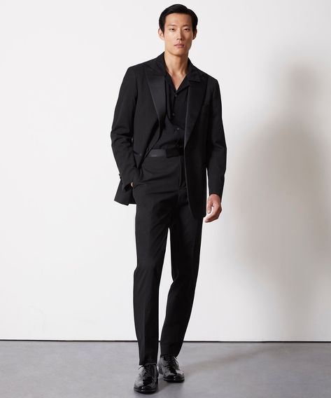 An essential for the well-dressed, this luxurious tuxedo pant is crafted in handsome black wool from a renowned Italian mill, Subalpino. It's impeccable tailoring works on everyone: slim, modern, with a slight taper to the leg. Other premium details include the single satin stripe at the outside seam, as well as a bit Tuxedo Pants, Todd Snyder, Tailored Suits, Black Wool, Well Dressed, The Well, New Arrivals, Men Casual, Trousers