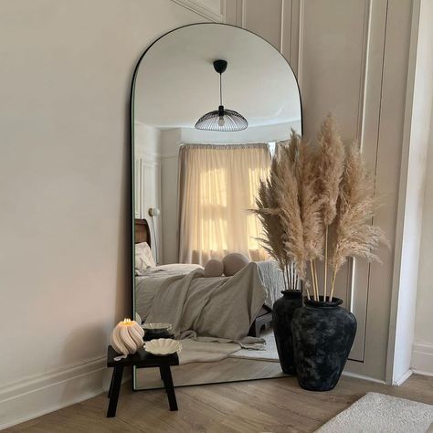 Brighten up any room in your home with this tall, elegant modern full length mirror. Its unique arched design and sleek frame make it a statement piece that adds depth and dimension to any room. Large Floor Mirror Styling, Big Room Mirror Bedrooms, Giant Mirror Bedroom, Big Mirror In Bedroom Aesthetic, Big Mirror In Living Room, Mirror Corner Ideas, Large Mirror In Bedroom, Mirror In Living Room Ideas, Big Mirror In Bedroom