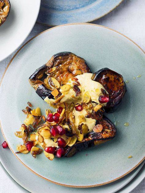 Roasted aubergine with curried yoghurt | Ottolenghi Recipes Roasted Aubergine, Yotam Ottolenghi Recipes, Brunch Salad, Ottolenghi Recipes, Desserts With Biscuits, Preserved Lemons, Yotam Ottolenghi, Party Food And Drinks, Pomegranate Seeds