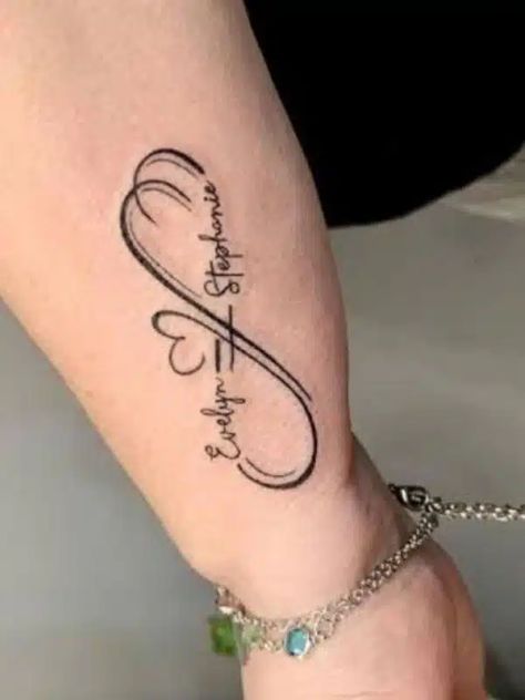 40+ Unique and Beautiful Ideas of Infinity Tattoos Delicate Infinity Tattoo, Infinity Symbol Tattoo With Names, Unique Name Tattoos Design For Women, Infinity Name Tattoos For Women, Tattoos For Women Infinity, Infinity Family Tattoos, Infinity Tattoo Designs With Name, Infinity Tattoo With Kids Names, Infinity Name Tattoo