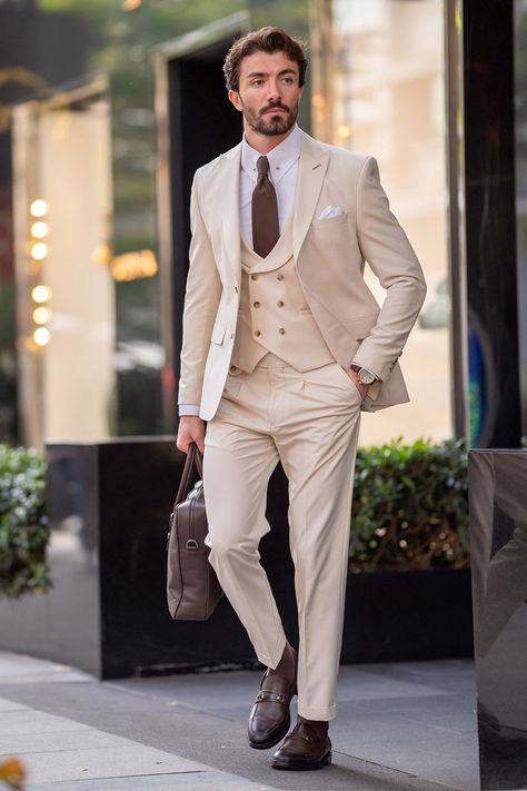 Command attention with the Beige Slim-Fit 3-Piece Suit from VIOSSI. The single-breasted blazer, boasting peak lapels and a refined 2-button closure, adds a modern flair. Pair it meticulously with the coordinating waistcoat and trousers for a distinguished, versatile ensemble. #slimfitsuit #beigesuit #peaklapels #mensfashion #elegantstyle #tailoredensemble #suitup #moderngentleman #formalwear #sophisticatedlook Beige Wedding Suit, 3 Piece Suit Men Wedding, Beige Suits For Men, 3 Piece Suit Men, Suits Groom, Double Breasted Tuxedo, Suit Styles, Suit Stores, Slim Fit Suit Men