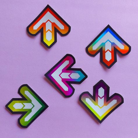 Dance Dance Revolution arrow stickers. #DanceDanceRevolution #ArcadeGames #Decals These holographic arcade game decals are perfect for any DDR fan. Stick them on your laptop, water bottle, or anywhere else you want to show your love of the . #Game_Stickers #Cute_Dance #Dance_Revolution #Dance_Dance_Revolution Game Stickers, Cute Dance, Dance Revolution, Dance Dance Revolution, Retro Arcade Games, Fairy Stickers, Rainbow Fairies, Dance Games