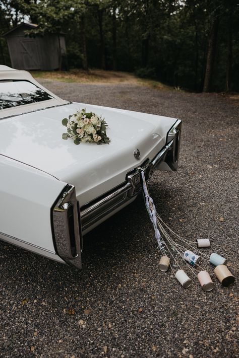 Riding in style in this white, vintage car. Wedding day details. Wedding exit with cans. Vintage style wedding. Wedding traditions. Wedding day ideas. Getaway car inspiration. bride and groom. just married. Getaway Car Wedding Decoration, Just Married Getaway Car, Wedding Cans For Car, Vintage Just Married Car, Wedding Car Cans, Just Married Car Cans, Old Cars Wedding, Old Car Wedding Photos, Just Married Cans