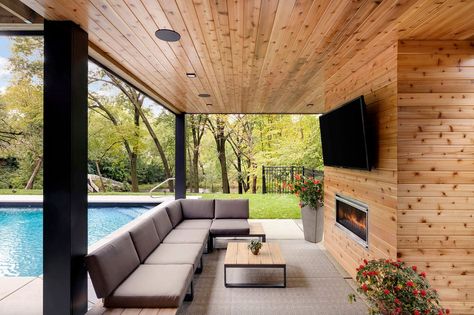 A mid century modern home with stunning creek views in Minnesota Outdoor Tvs, Outdoor Design Ideas, Outdoor Fireplace Designs, Fireplace Designs, Mid Century Modern Home, Beautiful Patios, Outdoor Tv, Tv Decor, Patio Designs