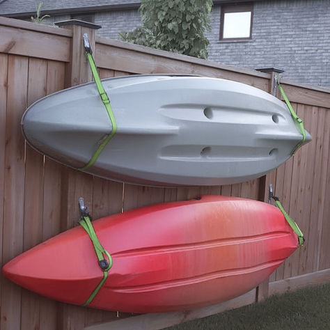 Here's a cool idea to store a kayak using straps. Storing Kayaks Outside, Kayak Hanging Ideas, Kayak Garage Storage, Kayak Storage Ideas, Kayak Rack Diy, Diy Kayak Storage, Kayak Storage Garage, Ceiling Storage Rack, Being Smart