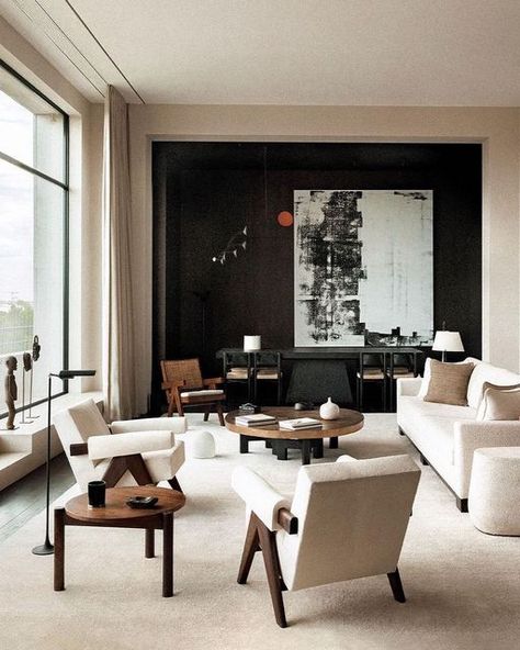 CW on Instagram: "Inside the home of Paul-Emmanuel Reiffers, designed by Vincent Van Duysen. A painting by Christopher Wool hangs on the wall, alongside a hanging sculpture by Alexander Calder. Pierre Jeanneret armchairs and side table, as well as an Ado Chale coffee table, also feature in the living room." Vincent Van Duysen, Richard Serra, French Living, Art Deco Buildings, Charlotte Perriand, Pierre Jeanneret, Minimal Home, Paris Apartments, Design Del Prodotto