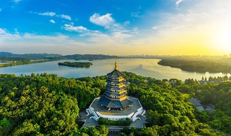 12 Top-Rated Tourist Attractions & Things to Do in Hangzhou | PlanetWare Place Of Worship, Hangzhou, Tourist Attraction, Top Rated, Statue Of Liberty, Worship, Things To Do, Statue, Natural Landmarks