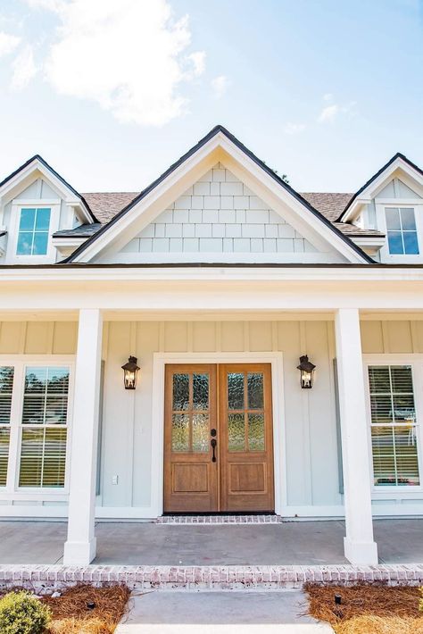 Siding Ideas Exterior White Windows, White House With Wood Trim, Vertical Siding House, Cream House With White Trim, Home Exterior With White Windows, Shingle And Board And Batten Siding, Tan Farmhouse Exterior, Cream Farmhouse Exterior, White House With White Windows