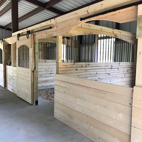 “Good Morning!  Here are my finished stalls. They are beautiful, just like I figured they would be. Thank you so much for sharing your design plans. “ ~Melinda ➖ Y’all, check these photos out!! (Make sure you swipe through to see them all.) These are the newly finished stalls Melinda built using my stall kit guide! Don’t they look great! 💜💯 THANKS for sharing the pics with me Melinda! ➖ The guide is ONLY $15! Head on over to the blog to get your copy. 💻 ➡️ www.thenorthcarolinacowgirl.com ➡️ Wood Horse Stalls, Diy Stalls For Horses, Barn Stall Ideas, Horse Stall Ideas, Luxury Horse Barns, Small Horse Barns, Barn Remodel, Stall Fronts, Barn Layout