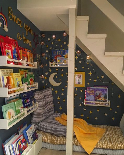 Beth | Our Rainbow Adventures on Instagram: “Finishing touches! ✨ It’s a starry night in the reading corner thanks to the leftover @made_of_sundays stickers from the bedroom revamp a…” Space Themed Reading Corner, Under Steps Reading Nook, Diy Reading Corner, Reading Corner Under Loft Bed, Children’s Reading Corner, Closet Reading Nook Kids, Reading Nook Kids Bedroom, Kids Reading Corner, Reading Corner Kids Room