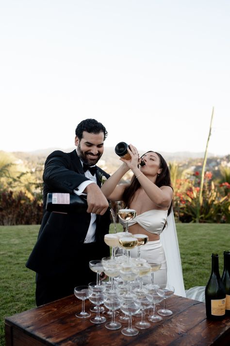 JUST MARRIED. Our destination wedding in Sayulita, MX. Bride: @kclifff Groom: @a_mendoza_ Photographer: @vmpineda.photo #weddingideas #veil #bridalveil #modernbride #bridaljewelry #bridebouquet #sayulita #destinationwedding #Weddingdress #groom #sayulitawedding #champagnetower #champagnetoast Mendoza Wedding, Champagne Tower, Champagne Toast, Bride Bouquets, Mendoza, Bridal Veil, Modern Bride, Just Married, Veil