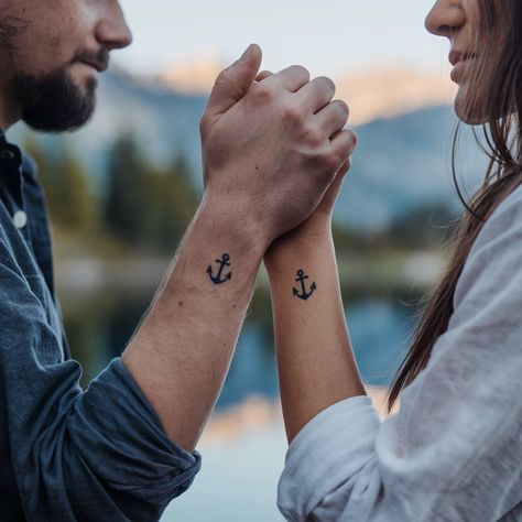 Getting small matching tattoos as a married couple is a beautiful way to express love and commitment. These tattoos not only reflect your unique bond but also serve as a permanent reminder of your journey together. Below, you’ll find 30 inspiring ideas that can help you choose the perfect small tattoo to match with your spouse. Matching Compass Tattoos, Matching Tattoos For Married Couples, Anniversary Tattoo Ideas, Spouse Tattoos, Tattoos Elegant, Small Dainty Tattoos, Married Couple Tattoos, Anniversary Tattoo, Small Matching Tattoos