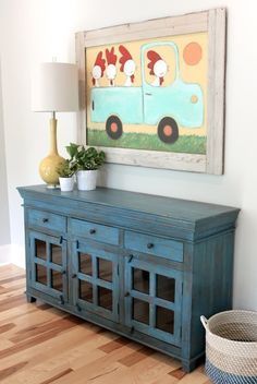 fabulous folk art. I LOVE the color of the buffet! Reka Bentuk Ruang Tamu, Dresser In Living Room, Rustic Buffet, Dining Hutch, Farmhouse Buffet, Kitchen Table Makeover, Dresser Design, Table Makeover, Farmhouse Dining Room