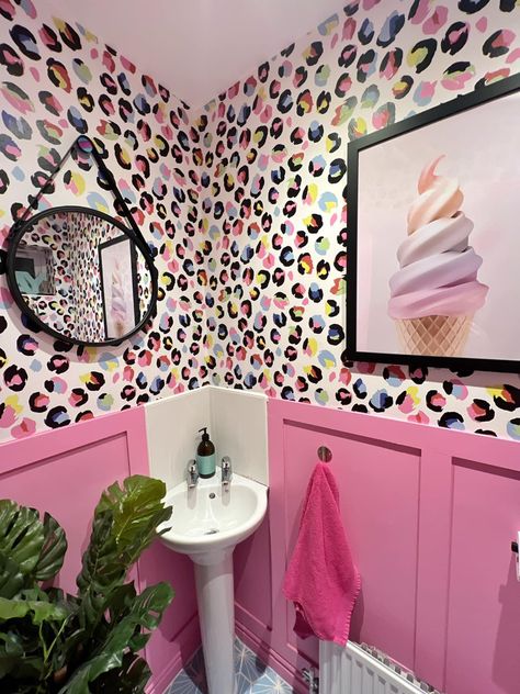 Pink Leopard Bathroom, Pink Panelling And Wallpaper, Diy Leopard Print Wall, Pink Downstairs Toilet Ideas, Lisa Frank Bathroom, Rainbow Leopard Print Wallpaper, Small Bathroom Bold Wallpaper, Small Bathroom Remodel Wallpaper, Pink Panelling Bathroom