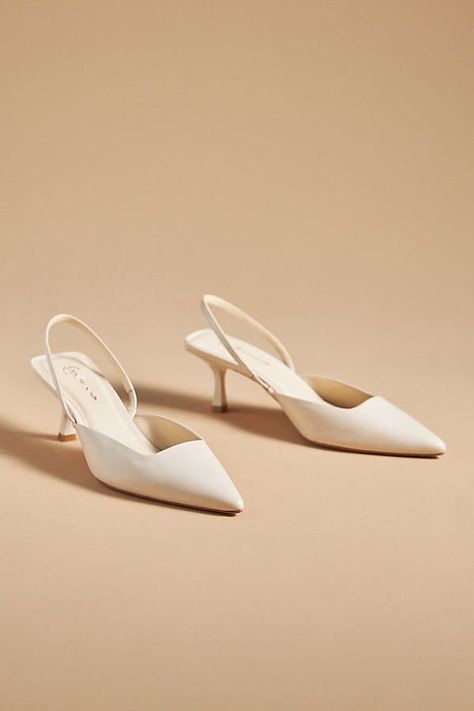 Wedding shoes low heel for elegant brides who want to maintain style without sacrificing comfort. Ivory Slingback Heels, Slingback Wedding Shoes, Bridal Slingback Heels, Low Heel Wedding Shoes Brides, Elegant Slingback Heels, Shoes For White Dress, Wedding Dress With Shoes, Low White Heels, Wedding Kitten Heels