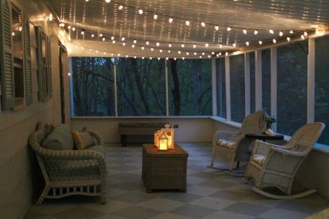 Simple screened porch light - outdoor string lights make everything look pretty and are easy to install. Porch Lighting Ideas, Porch String Lights, Porch Kits, Christmas Lights Outside, White Christmas Lights, Christmas Light Installation, Christmas House Lights, Building A Porch, Porch Light