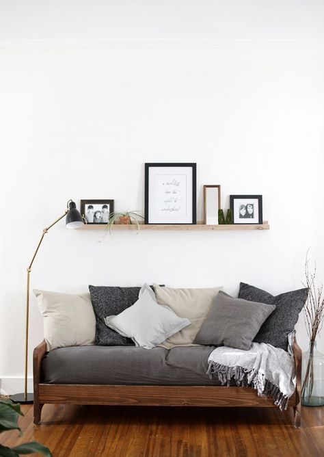 picture ledge and pillows Small Guest Bedroom Ideas, Futon Living Room, Photo Ledge, Small Modern Living Room, Small Guest Bedroom, Small Living Room Decor, Living Room Grey, Couches Living Room, Apartment Room