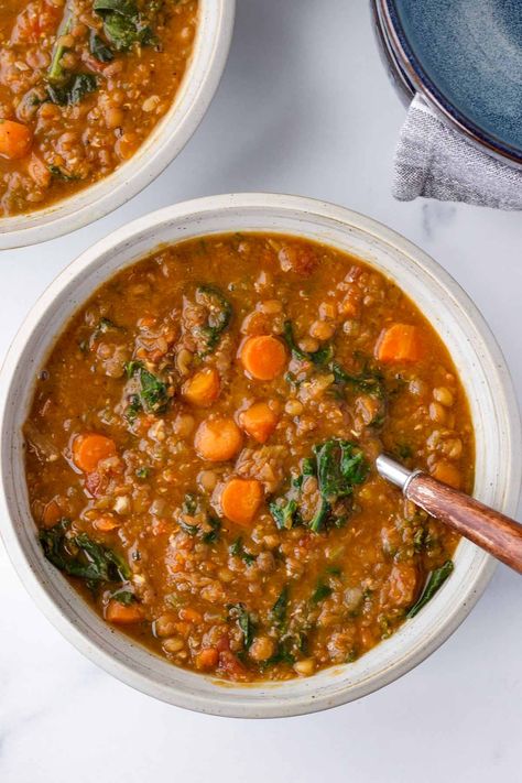 Upgrade your lentil soup game with this flavorful Lentil Kale Soup! Loaded with aromatic spices, hearty lentils, and nutritious kale and carrots, it's perfect for a nourishing meal. This lentil soup is meal prep and freezer friendly. Lentil Kale Soup, Freezer Soups, Soup Maker Recipes, Soup Maker, Kale Soup, Green Lentils, Carrot Soup, Tomato Vegetable, Winter Soups