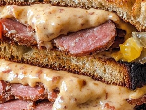 Pennsylvania’s Polish Delight: The Kielbasa Reuben Recipe You Can’t Miss - NewsBreak Polish Sausage Sandwich, Pistachio Tiramisu Recipe, Cheese Crescent Roll Recipes, Fluffy Buttermilk Pancake Recipe, Honey Garlic Ribs, Reuben Recipe, Candied Walnut Recipe, Homemade Funnel Cake, Sausage Sandwich