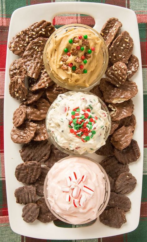 Christmas Dessert Dip Platter with Christmas Cookie Dough Dip, Gingerbread Dip, Peppermint Fluff Dip with Chocolate Covered Potato Chips for dipping. #christmas #christmasrecipes #desserts Christmas Dessert Dip, Gingerbread Dip, Christmas Cookie Dough Dip, Christmas Cookie Dough, Fluff Dip, Chocolate Covered Potato Chips, Christmas Dip, Dip Platter, Dessert Dip