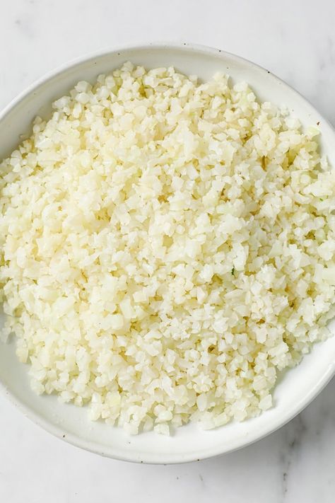 Frozen cauliflower rice is a healthy and convenient option for those looking for a quick and easy way to add more vegetables to their diet. It is simply raw cauliflower that has been processed into small, rice-like pieces and then frozen. #cauliflowerrice #frozencauliflowerrice #frozenveggies Cauliflower Rice Recipes Healthy, Make Cauliflower Rice, Cooked White Rice, Cauliflower Rice Casserole, How To Cook Cauliflower, Healthy Rice Recipes, Healthy Sushi, Like Rice, Frozen Cauliflower