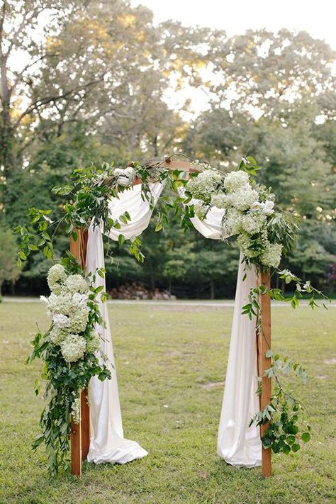 I love hydrangea. If you are scheduling your wedding during hydrangea season you can save lots of money by using your own or asking others for theirs.  You can decorate galore with hydrangea! Wedding Arch Tulle, Navy Suits, Wedding Flowers Hydrangea, Wedding Arbors, Wedding Ceremony Arch, Hydrangeas Wedding, Wedding Arbour, Summer Wedding Outdoor, Boho Wedding Inspiration