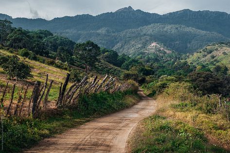 Countryside Gravel Road Through The Mountains | Stocksy United Iron Sky, Gravel Pathway, Character And Setting, Gravel Road, Screen Savers, Us Images, The Mountain, Mood Board, Royalty Free Stock Photos