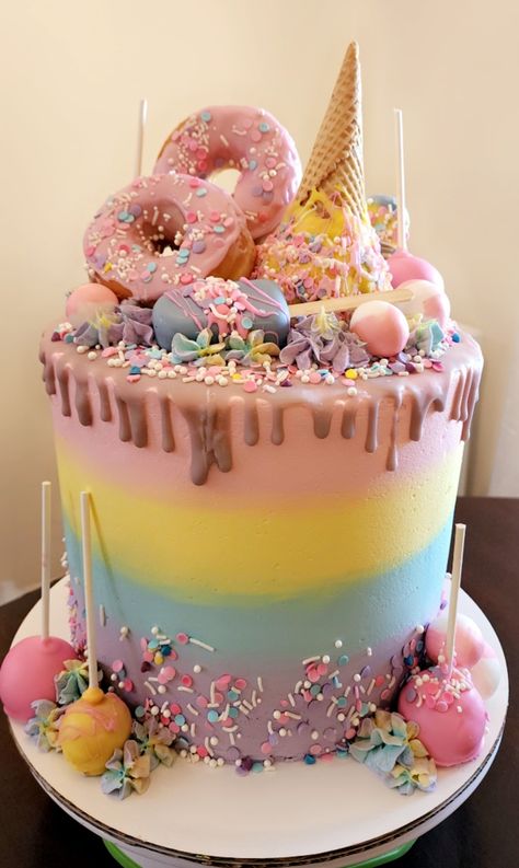 Cake With Donut Decorations, Diy Ice Cream Theme Cake, Cake That Looks Like Donut, Candyland Party Cake, Donut Cupcake Cake, Candyland Birthday Cake Ideas, Birthday Cake Donut Theme, Donut Cake Decoration, Donut And Ice Cream Birthday Cake