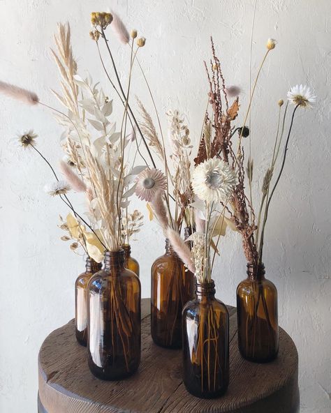 Brown Bottles Decor, Dried Flower Bottle, Dried Flowers In Bottles, Witchcraft Party, Apothecary Branding, Apothecary Store, Chalet Bedroom, Clear Wine Bottle, Easter 2024