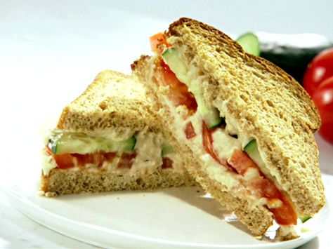 Cucumber and Tomato Sandwich with Garlic White Bean Hummus from FoodNetwork.com Basil Mayonnaise Recipe, Special Sandwiches, White Bean Hummus Recipe, Bean Hummus Recipe, Lunch Dishes, Lemon Hummus, Cucumber Sandwich, Cucumber And Tomato, White Bean Hummus