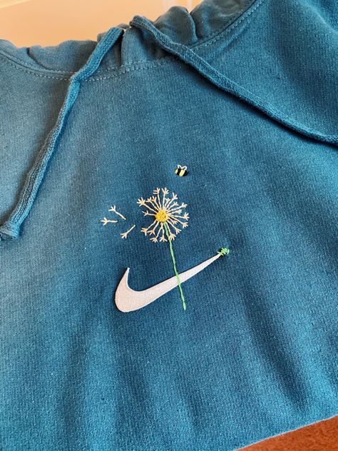 dandelion on nike hoodie embroidery design Nike Swoosh Embroidery Diy, Nike Hoodie Embroidery, Embroidery Designs For Hoodie, Hoodie Embroidery Diy, Embroidery Hoodie Diy, Embroidery Hoodie Ideas, Nike Embroidery Sweatshirt, Hoodie Embroidery Ideas, Embroidery On Hoodies