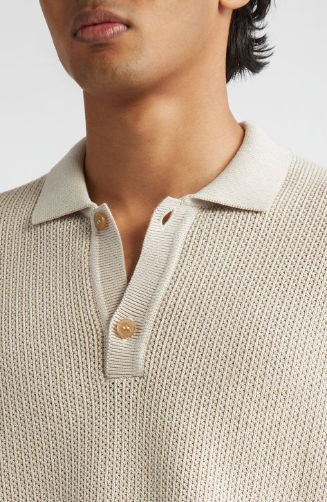 The renowned British label has perfected the polo with this Egyptian-cotton version knit with a subtle two-color design that gives it texture and depth. 25 1/2" length (size Medium) Button half placket Spread collar Short sleeves 100% cotton Dry clean or machine wash, dry flat Made in Portugal Designer Clothing Sweater Polos, Knitwear Details, Polo Knit, Knitted Polo, Knit Polo, Textured Knit, Egyptian Cotton, Fabric Gifts, Free Fabric