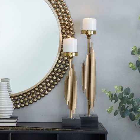 The Novogratz Gold Stainless Steel Candle Holder (Set of 2) - Bed Bath & Beyond - 36510598 Gold Pillar Candle Holders, Pillar Decorations, Gold Pillar Candles, Contemporary Candle Holders, Steel Candle Holder, Candle Holders Wall Decor, Metal Console Table, Gold Candle Holders, Coloured Candles