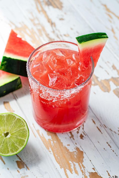 My watermelon margarita is FRESH and refreshing. Made with homemade watermelon juice, fresh lime juice, tequila, triple sec, and simple sugar, it's literally summer in a glass. These are best served on the rocks, but they can also be made frozen. #margarita #summercocktails #watermelonmargarita Watermelon Margarita On The Rocks, Frozen Margarita, Margarita On The Rocks, Watermelon Margarita, Simple Sugar, Watermelon Juice, Margarita Recipes, Triple Sec, On The Rocks