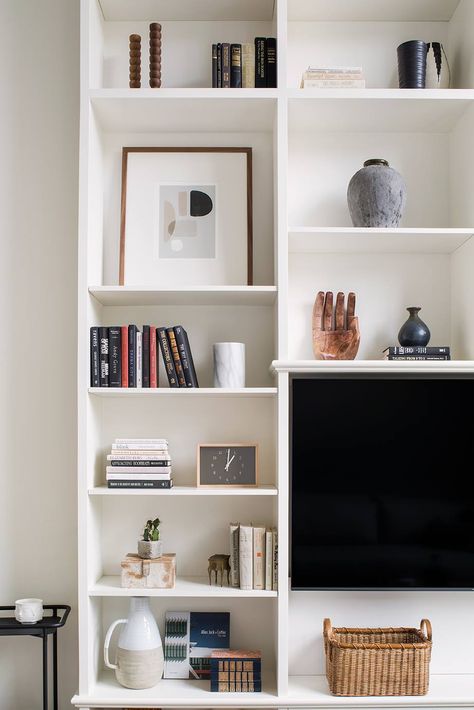 Tv Wall Layout, Loft Bookcase, Eclectic Shelving, Media Wall Ideas, Loft Style Living Room, Stained Wood Beams, Eclectic Loft, Loft Style Living, Wall Layout