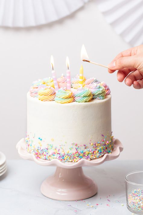 Rainbow sprinkle cake with buttercream frosting and candles.  Now you can make your own homemade Funfetti cake from scratch! #rainbowcake #sprinklecake #funfetticake #birthdaycake Leap Year Birthday Cake, Funfetti Cake From Scratch, Rainbow Sprinkle Cake, Homemade Funfetti Cake, Rainbow Sprinkle Cakes, Rainbow Cake Recipe, Cake With Buttercream Frosting, Sprinkles Birthday Cake, Rainbow Sprinkle