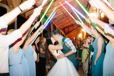 A light saber wedding send-off... Always a crowd pleaser! Love it! Follow this pin to our blog for more wedding send-off ideas! #weddingsendoff #weddingideas #weddingexit #sendoff #sendoffideas #lightsabers #starwarswedding Lightsaber Wedding Send Off, Sendoff Ideas, Wedding Car Decor, Send Off Ideas, Wedding Pictures Ideas, Wedding Send Off, Wedding Exits, Star Wars Wedding, Lover Girl