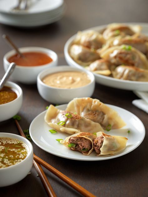 Beef Pot Stickers with Dipping Sauces. Check out this recipe and more Texas Favorites at the new beeflovingtexans.com Wonton Wrapper Recipes Ground Beef, Cheese Calzone, Chinese Pot, Dumpling Recipes, Beef Dumplings, Chinese Beef, Cut Recipe, Peanut Dipping Sauces, Wonton Recipes