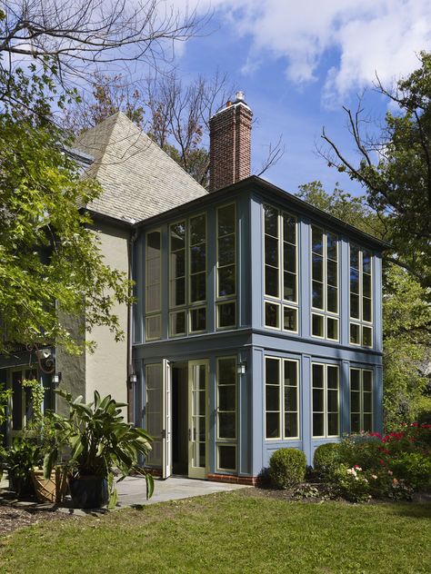 Home Renovation in Philadelphia by Krieger + Associates Architects. This photograph shows the renovated 2-story sunroom. Photograph by Jeffrey Totaro Two Story Greenhouse Addition, Two Story Conservatory, Two Story Sunroom Addition, Exterior Addition Ideas, Second Story Sunroom Addition, Sunroom Addition Exterior, Two Story Addition Back Of House, Two Story Sunroom, Second Story Sunroom