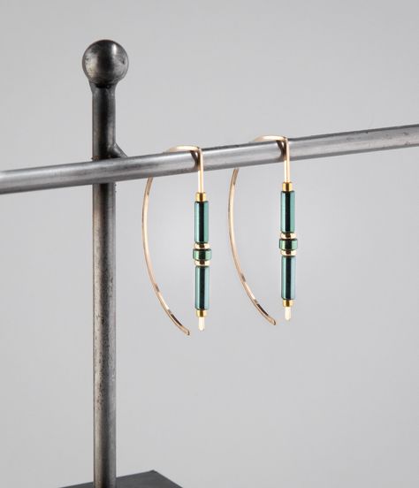 Modern gold hoops designed with green hematite beads. These open hoops have a unique design without being overstated.  Handmade in my studio, all of my jewelry is carefully crafted with attention to detail, each piece is a unique design and a one of a kind gift. Details at a glance >Comfortable 20 gauge 14K gold filled ear wire. >14K Gold filed beads/Green hematite Beads.        >Length is 1.75" or 44 mm. >Polished finish, hammered end. >Made-to-order, ready to ship in 3-5 business days. >Beauti How To Make Metal Jewelry, Fall Winter 2024/2025 Jewelry Trends, Gold Wire Jewelry, Two Tone Jewelry, Unique Jewelry Vintage, Wire Earrings Handmade, Hoop Earrings Handmade, Earring Inspiration, Hammered Jewelry