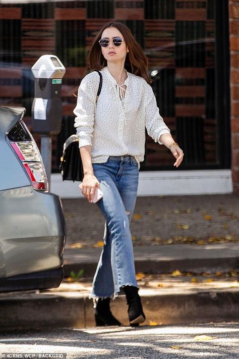 Lily Collins looks chic in a polka dot blouse and distressed jeans | Daily Mail Online Lily Collins Casual, Emily In Paris Outfits, Lily Collins Style, Dakota Style, Slay The Day, Celebrity Casual Outfits, Paris Outfits, Trendy Street Style, Outfit Trends