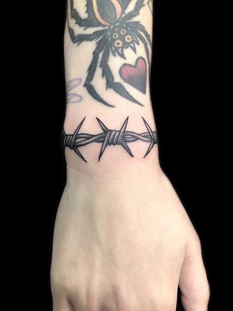 Wrist Tattoos Barbed Wire, Wrap Around Wrist Tattoos Traditional, American Traditional Wrap Around Tattoo, Barbwire Wrist Tattoo, Barb Wire Wrist Tattoo, American Traditional Chain Tattoo, Wrist Tattoo Traditional, Traditional Wrist Cuff Tattoo, Wrist Tattoos Traditional