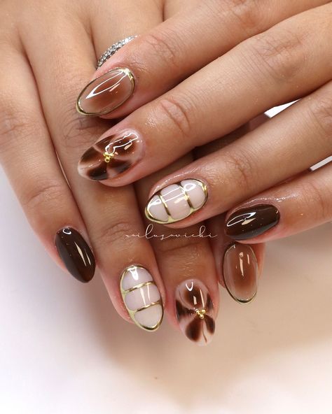 If brown isn’t a fall staple then idk what is 🍂🤎 . . #nails #nailusa #nailart #naildesign #nailsofinstagram #naildesigns #nailsoftheday #naildesignsideas #gel #gelnails #raleigh #durham #nailinspo #raleighnailtech #ncnails #raleighnails #raleighnailtech #trend #trendynails #BIAB #springnails #BIABnails #summernails #naturalnails #raleighgelx #gelx #gelxnails #fallnails Brown Nails Blooming Gel, Burgundy And Brown Nails, Brown 3d Nails, Brown Blooming Gel Nails, Brown Tip Acrylic Nails, Brown Croc Nails, Short Nails With Designs, Gelx Inspo Nails, Blooming Gel Nails