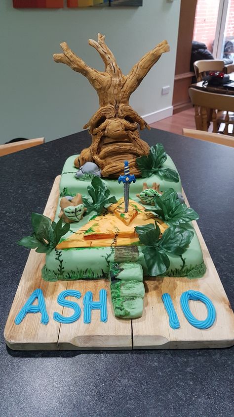 Breath Of The Wild Birthday Cake, Zelda Botw Cake, Zelda Breath Of The Wild Cake, Easy Zelda Cake, Link Birthday Cake Zelda, Deku Tree, Zelda Cake, Zelda Birthday, Tree Cakes